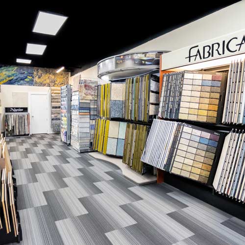 Private showroom with hundreds of samples of the latest and hottest carpets, rugs & flooring for designers to choose.